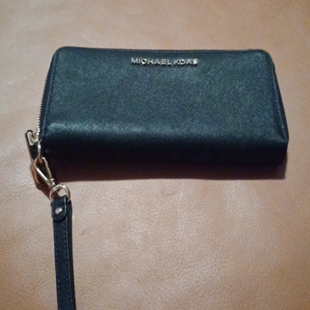 > Michael Kors Black Wristlet with Gold Accents